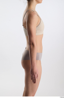 Zolzaya  1 arm flexing side view underwear 0001.jpg